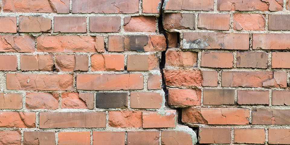 Cracked brick wall